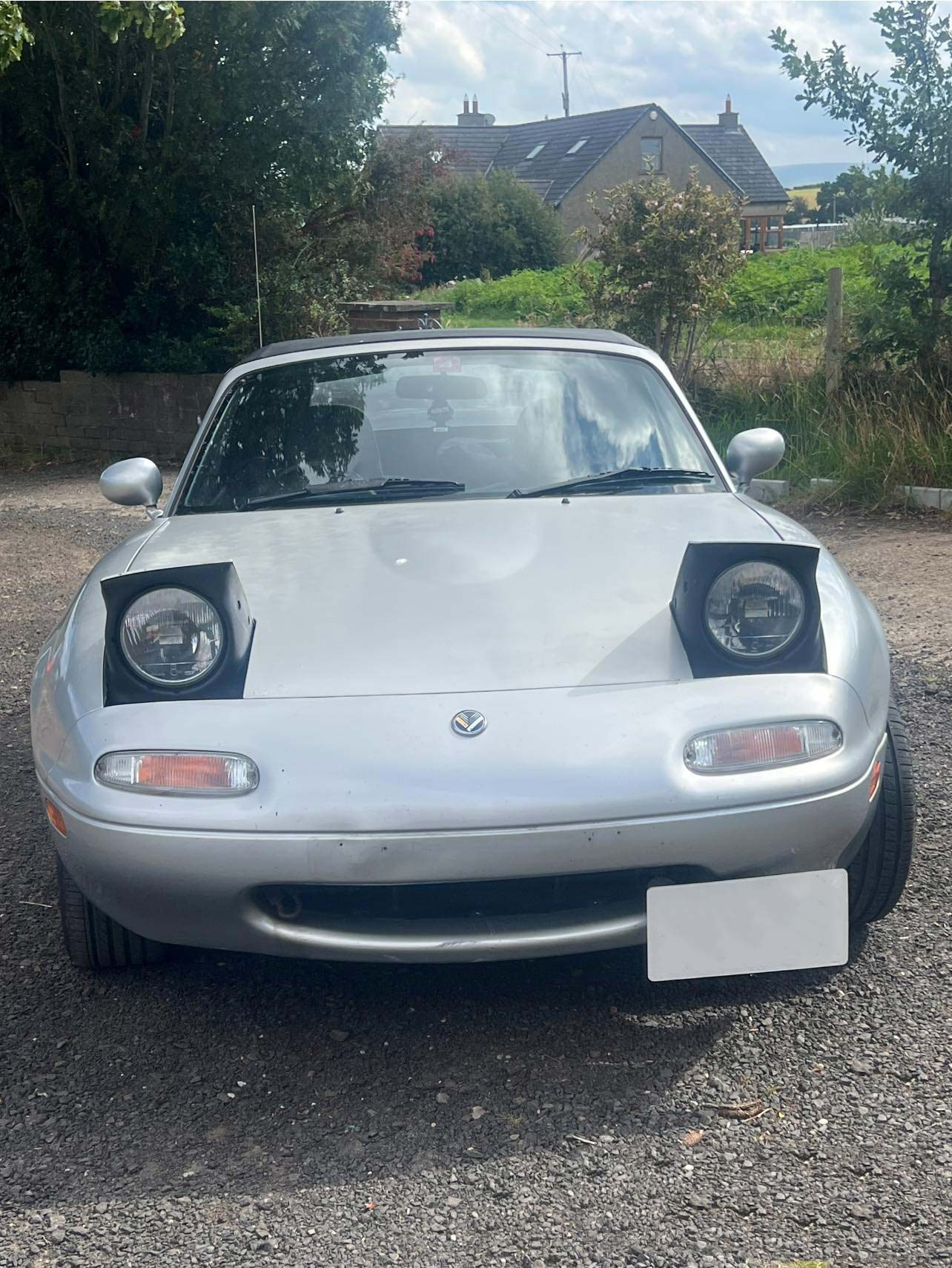 miata front cleaned Vehicle paint correction and protection by MC AutoGleam Detailing